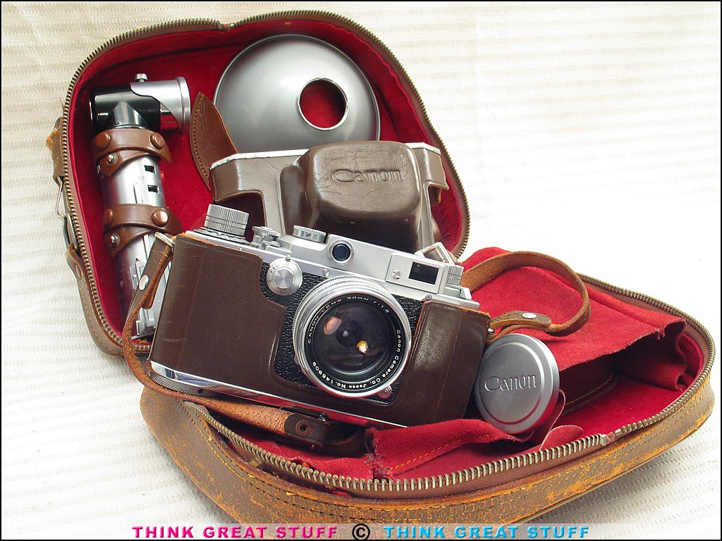 Photo 100_3707 Product photo #100_3707 of SKU 21001183 (Canon IIF2 EP, 1955 vintage 35mm Rangefinder Camera Outfit)